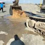 Digger Driver Scoops Cow From Flood Water