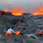 Scientist Shovels Molten Lava Into A Bucket To Carry It Away For…