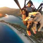 Man And Faithful Dog Embark On Sky-High Paragliding Adventure