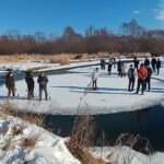 Excited Locals Go For Spin On Giant Ice Circle Formed On Frozen…