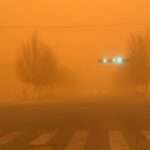 Cars Struggle To Move After Severe Sandstorm Turns Sky Orange