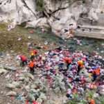 Authorities Clean River At Tourist Site Of Piles Of Clothes Thrown By…